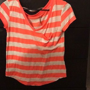 Cute orange and white shirt!